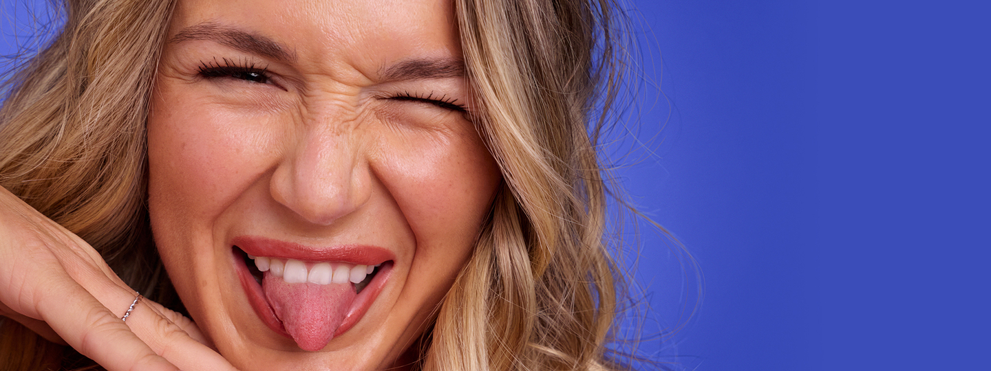 Woman smiling with styled long hair