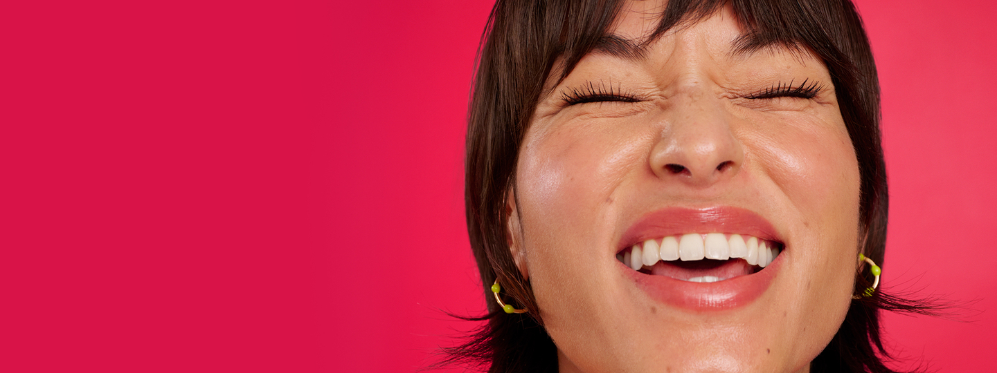 Smiling woman with short black hair